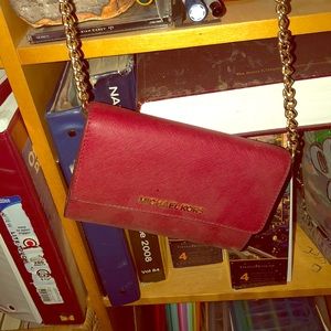 Red Michael Kors crossbody bag